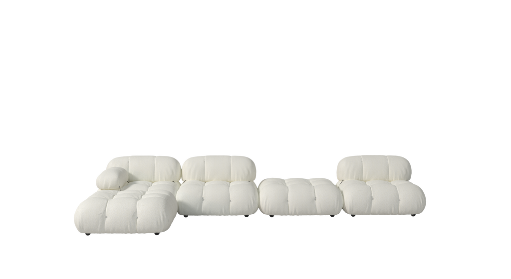 Modular sectional sofa with white fabric upholstery, segmented cushioning, low-profile backrests, and rounded armrests; supported by small black legs; designed for lounging and seating; features tufted stitching and soft, plush contours; Category: Furniture > Sofas > Sectionals