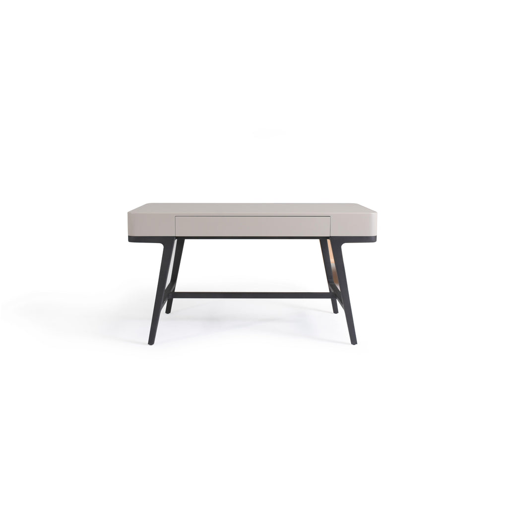 Modern desk with a light gray top and black legs, featuring a single drawer with a recessed handle, angled legs connected by a horizontal support bar, designed for work or study use; Category: furniture/desks