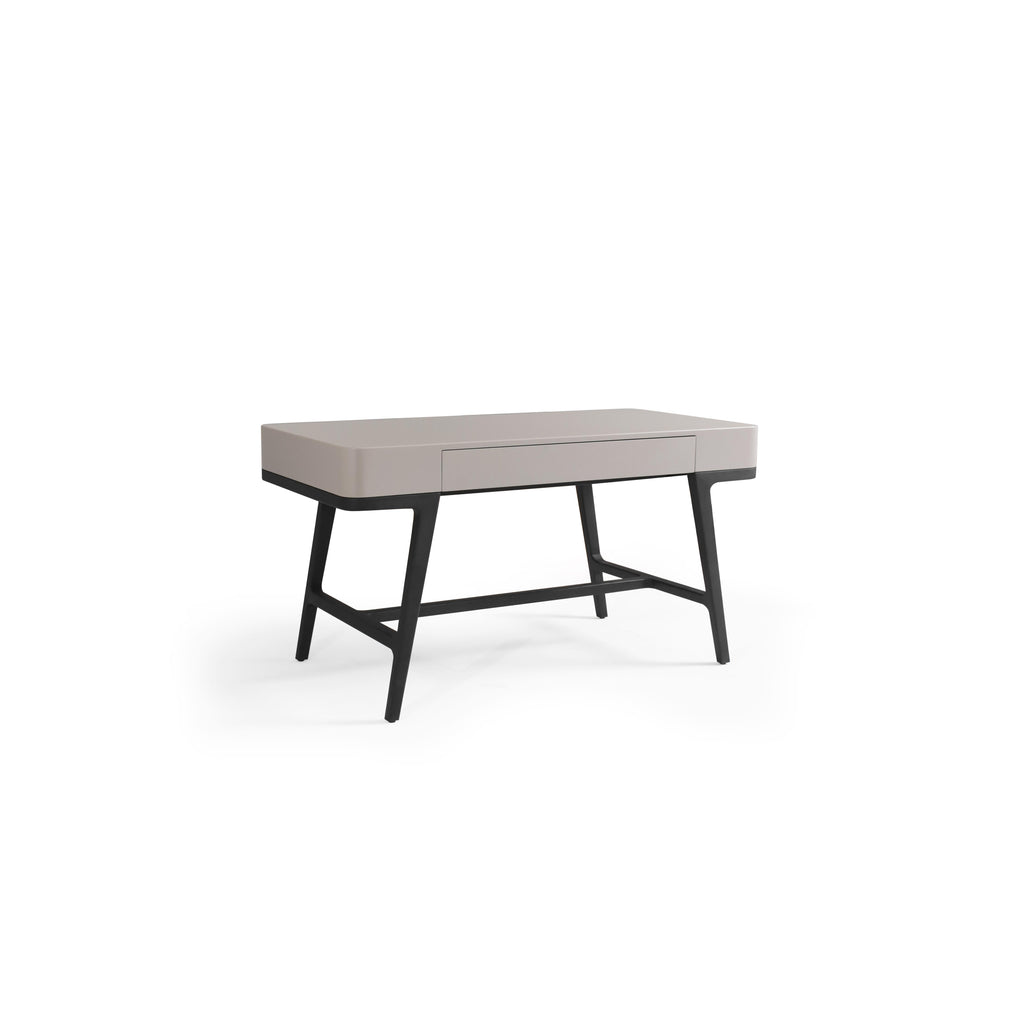 Modern desk with a light gray top and black legs, featuring a single drawer with a recessed handle, angled legs connected by a horizontal support bar, designed for work or study use; Category: furniture/desks