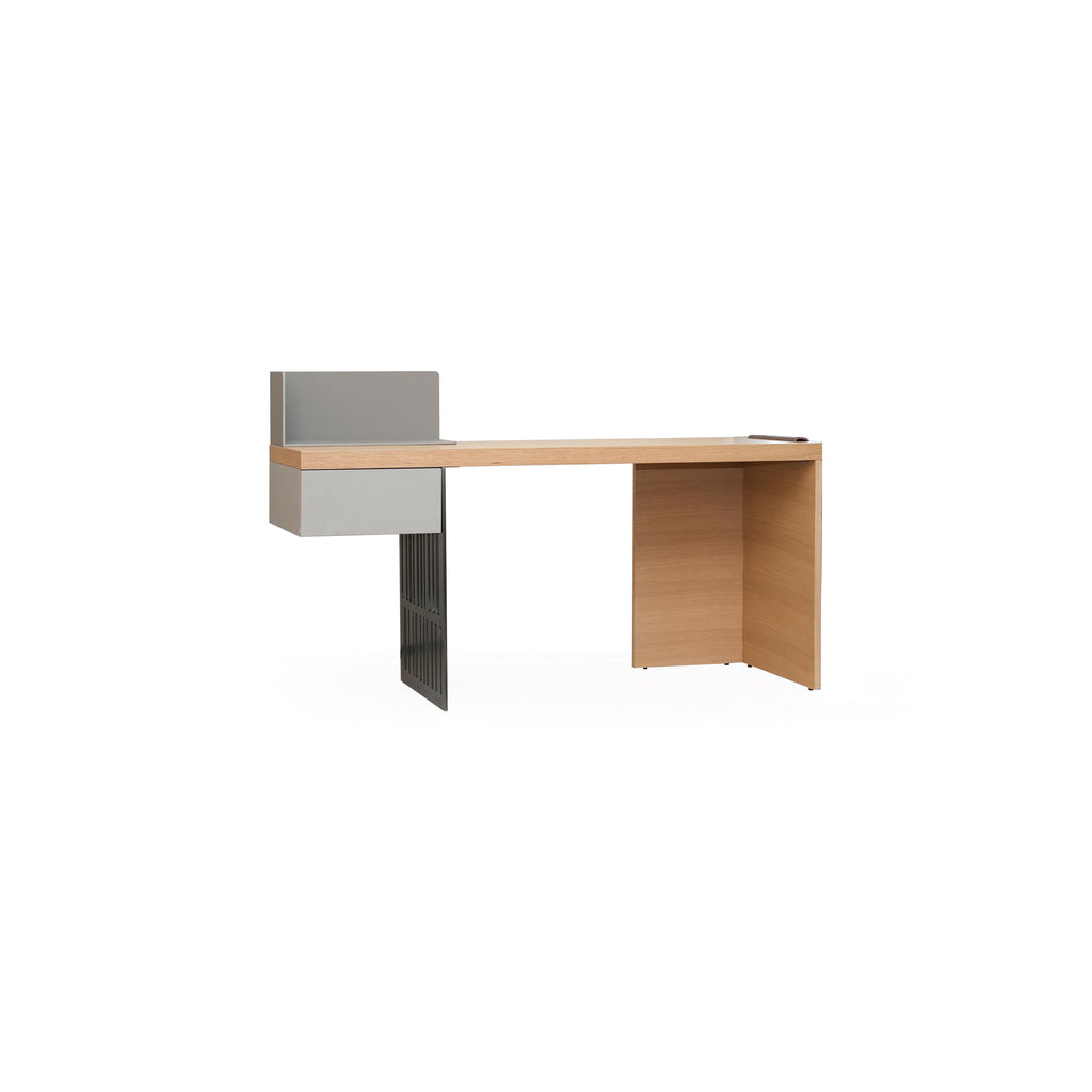 Modern desk with light wood top and gray drawer front, supported by a black metal leg and a wooden pedestal base; features a recessed storage compartment on the right side; intended for workspace use; Category: furniture/desks