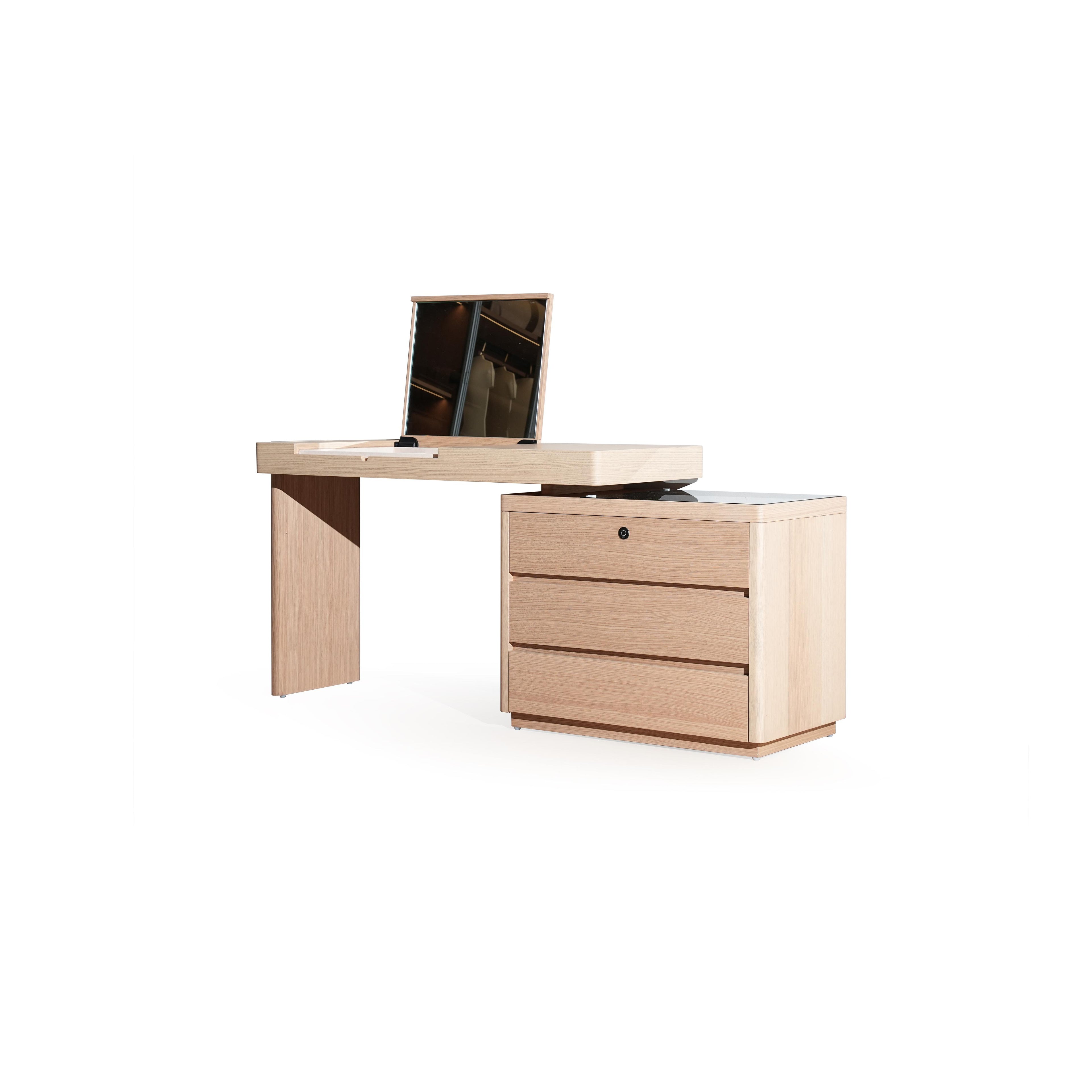 Modern vanity table with light wood finish and three drawers on the right side, featuring a mirrored top section that lifts to reveal a flat surface. The left side has a single vertical leg. Intended for personal grooming or desk use. Category: furniture > vanity tables